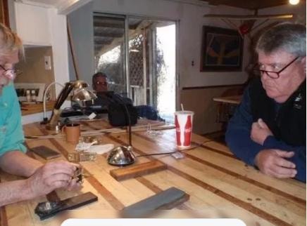 Students crafting bamboo fly rods in Scott Nilsson's workshop
